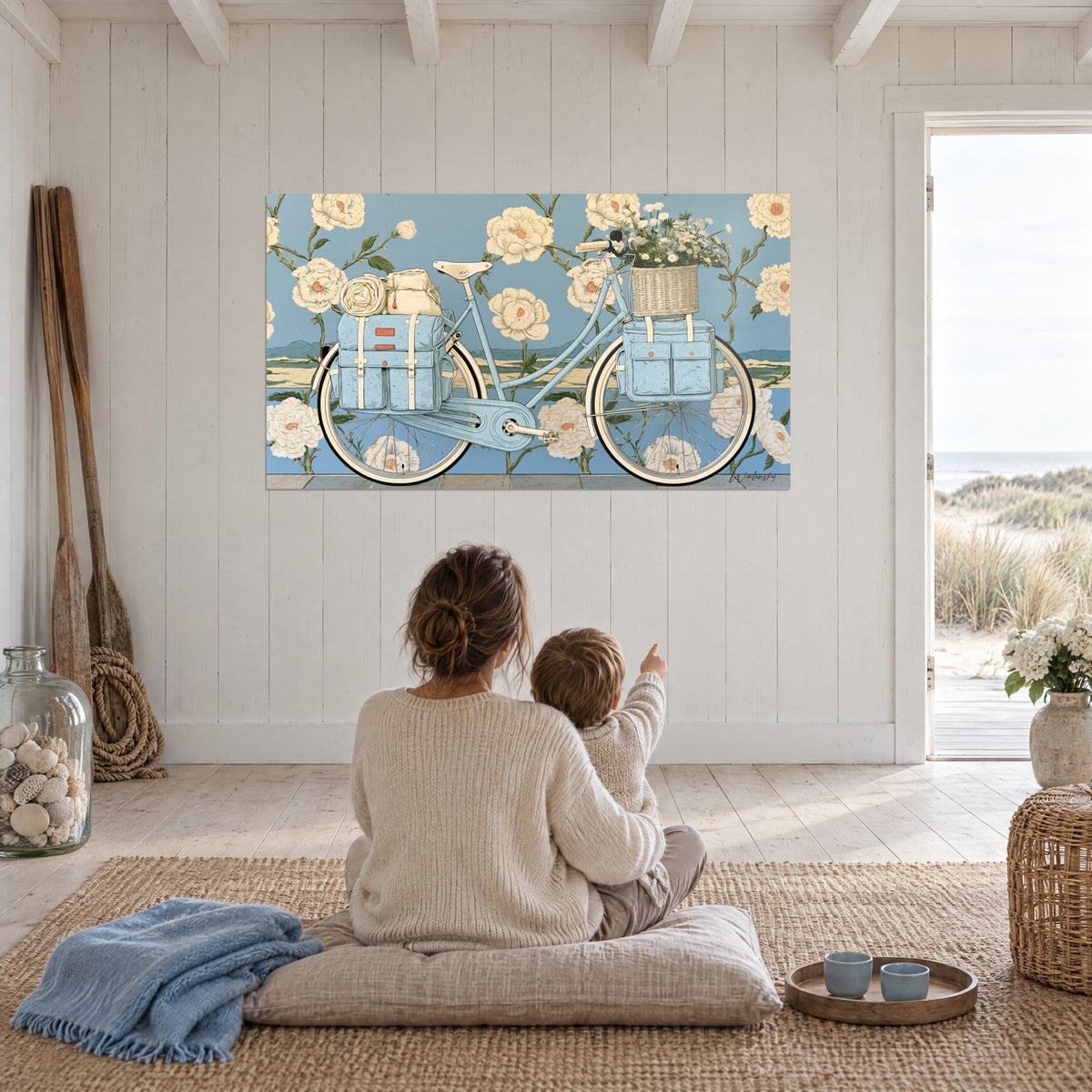 Tableau vélo pastel et fleurs de pivoine ivoire sur fond bleu, mère et enfant assis sur un coussin, face à la baie vitrée