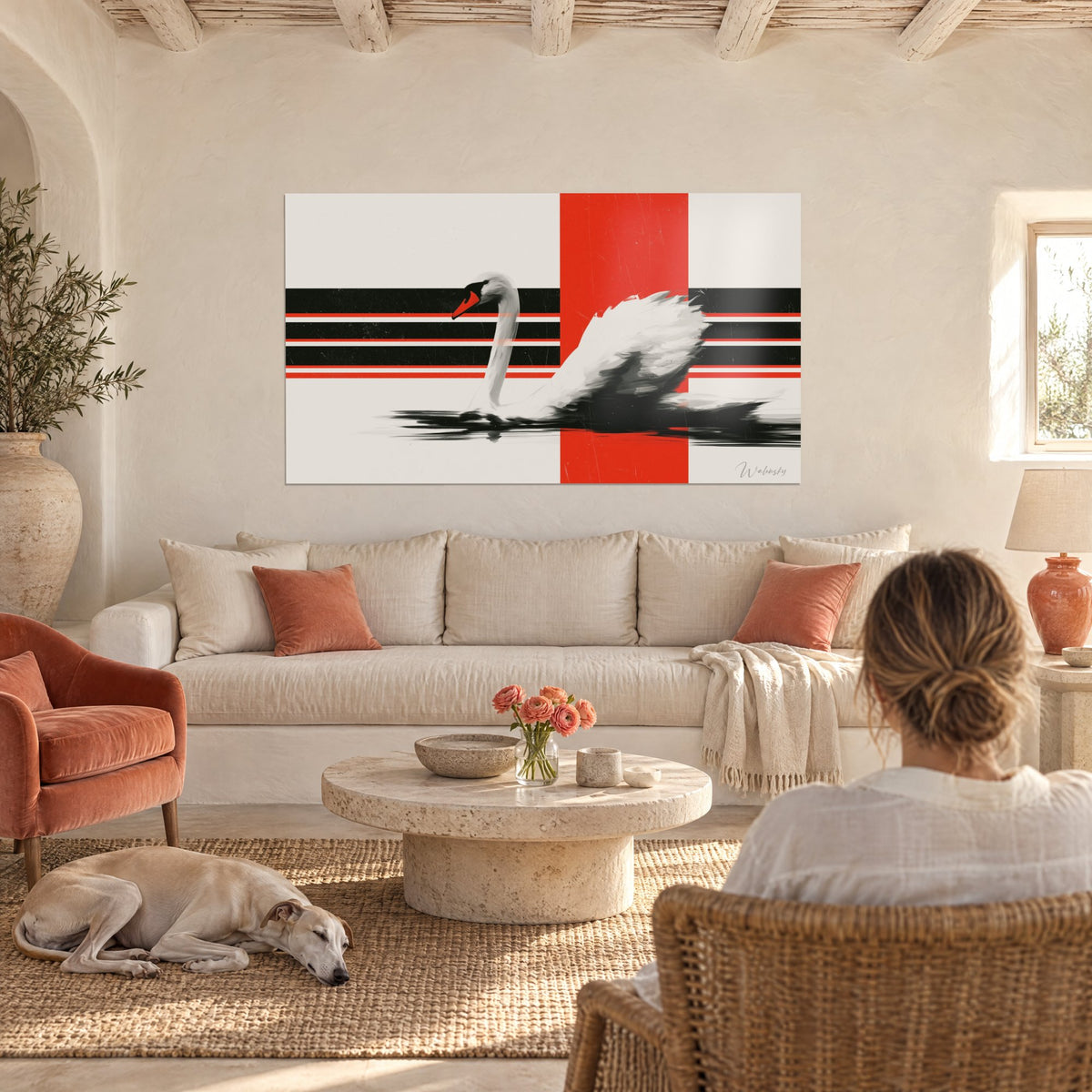 Quadro cigno bianco dal lungo collo, becco arancione, strisce nere e rosso vivo, sopra un divano in un soggiorno luminoso