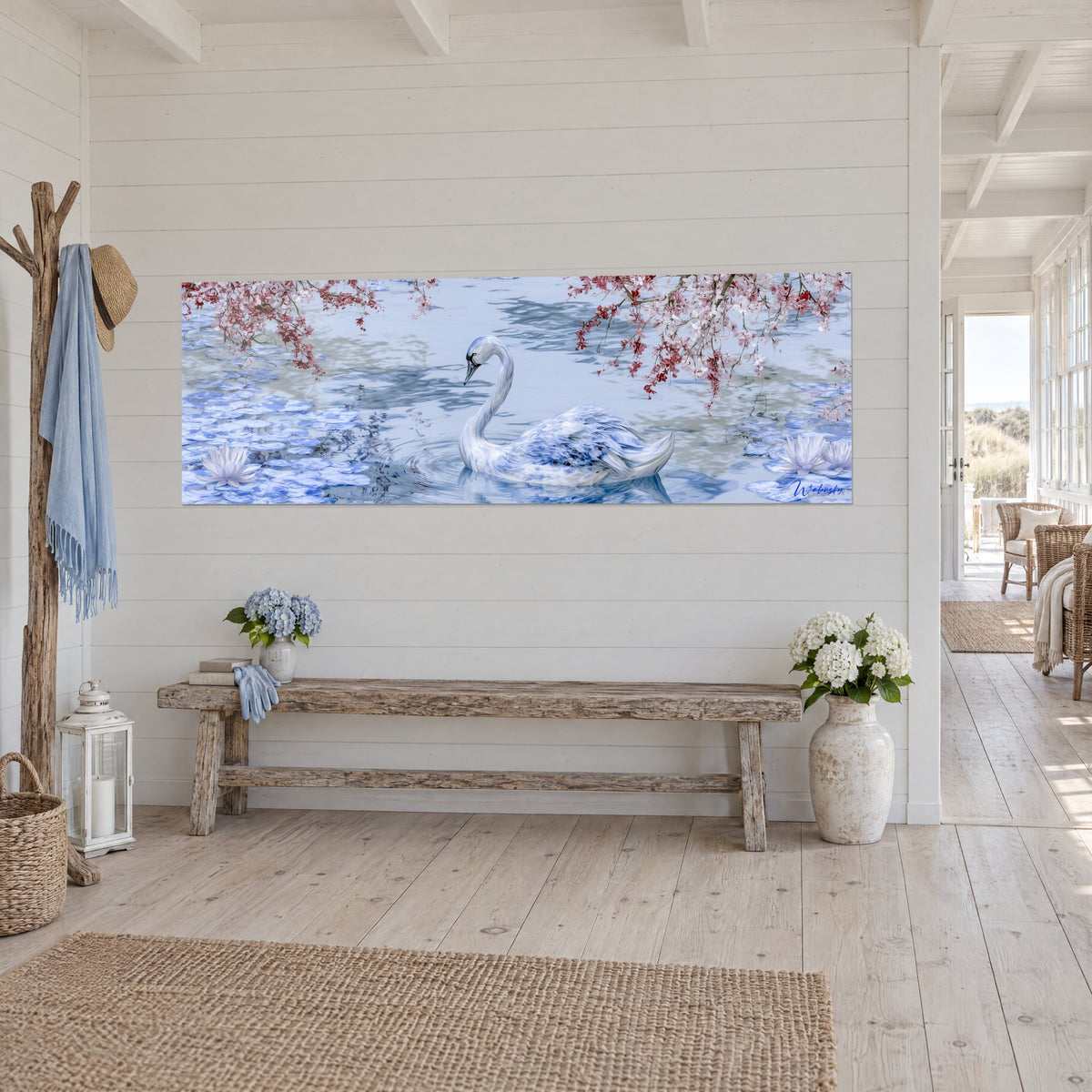 Tableau oiseau aquatique aux plumes blanc et indigo, ondes concentriques, cerisier en fleurs rose, banc rustique dans une maison de bord de mer