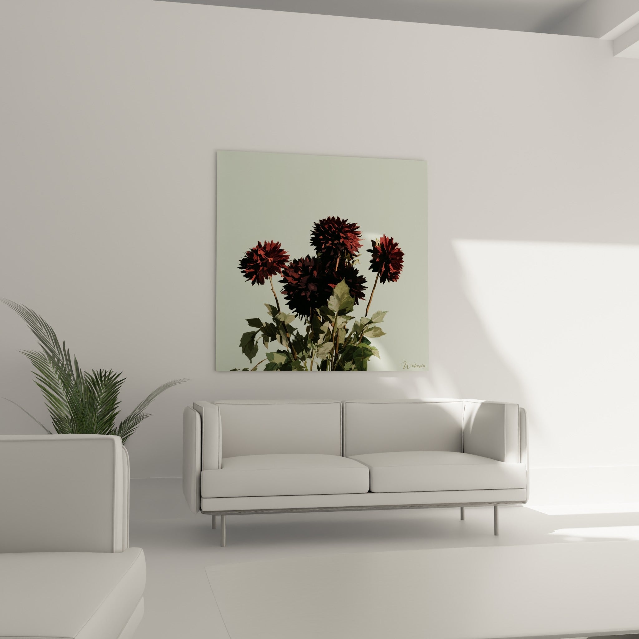 Bouquet de dahlias noirs et grenat accroché au-dessus d'un canapé dans un salon lumineux.