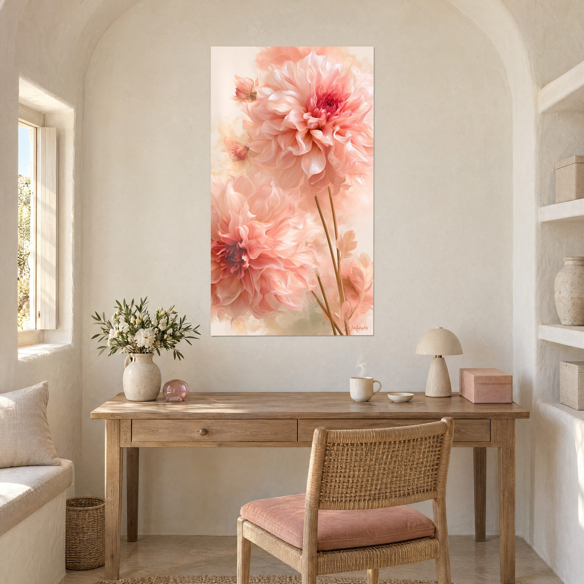 Wall art of a powdery pink and cream dahlia bloom with a waiting bud, above a light wood desk and a beige lamp