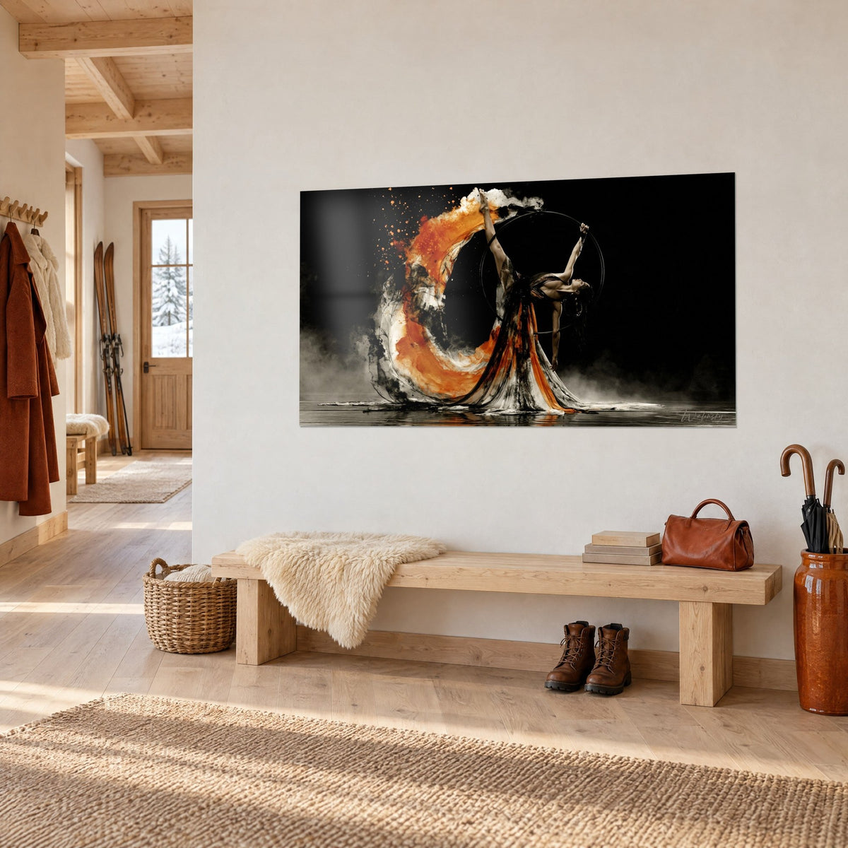 Tableau danseuse cambrée, jambe tendue vers le ciel et volutes orange vif, en vue de trois-quarts sur un mur blanc de chalet