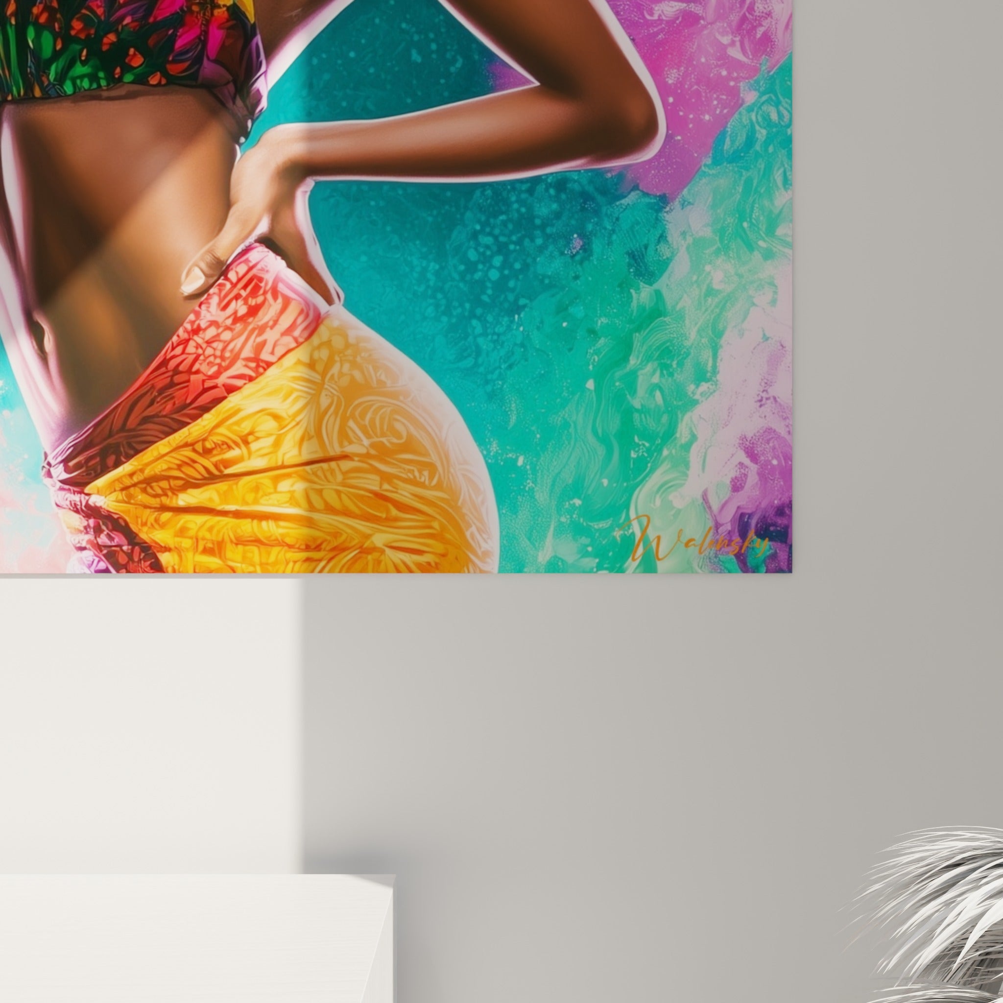 Détail des éclaboussures roses, turquoise et orangées entourant la silhouette de ce tableau danse africaine accroché