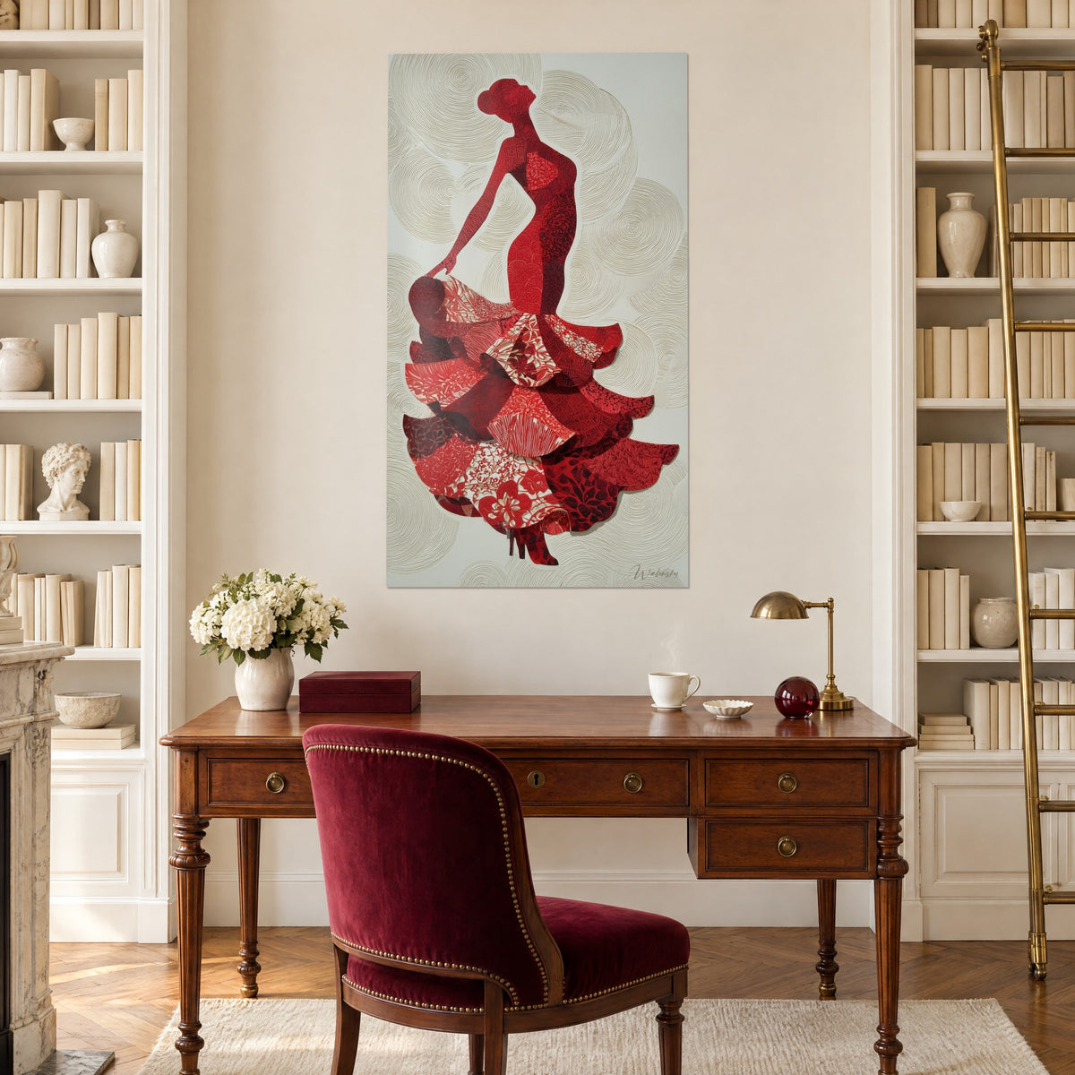 Wall art of billowing red and cream ruffles around an arched silhouette, wooden desk, bookshelves and a white fireplace