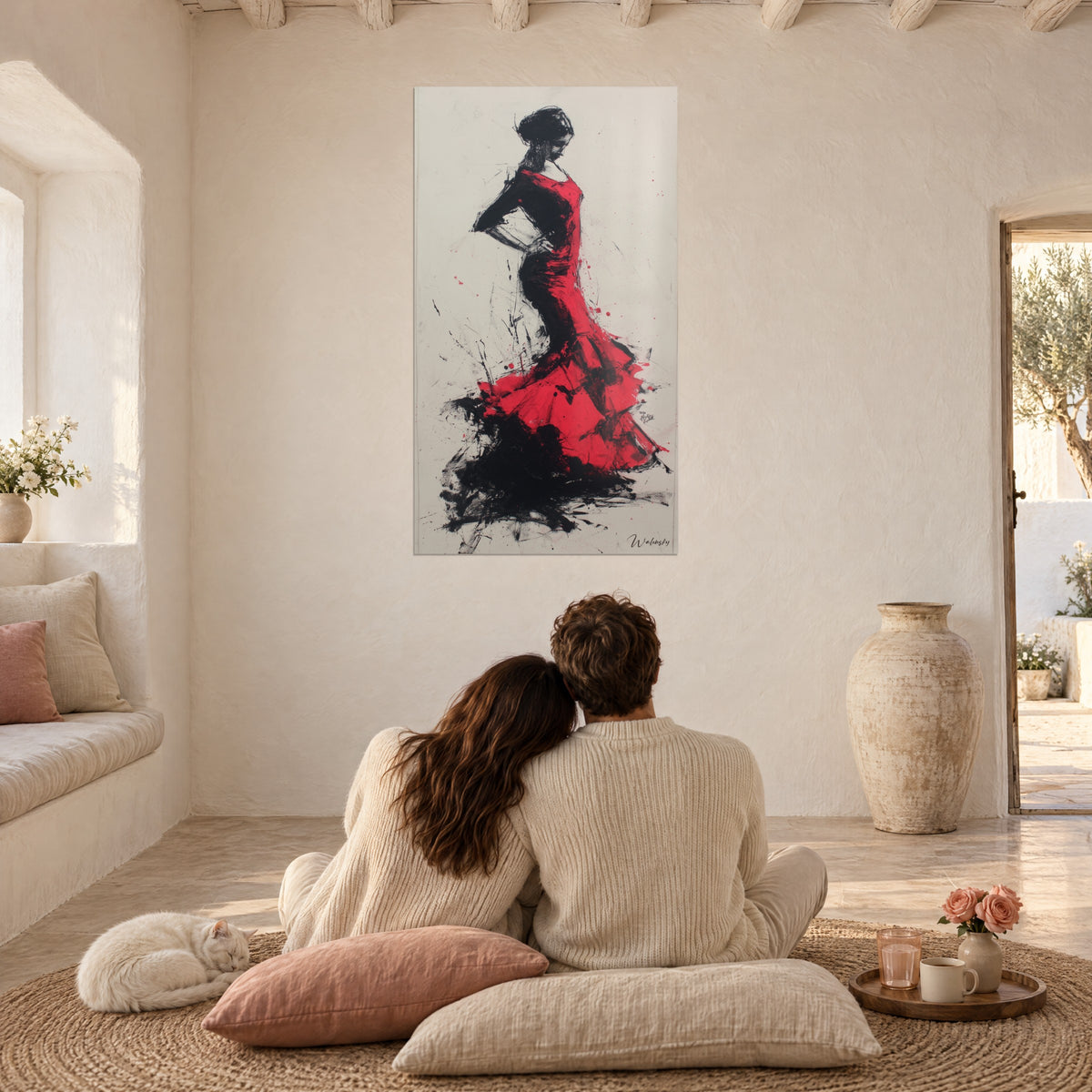 Wall art flamenco in red ruffled dress, black accents on ivory background, a couple seen from behind on cushions, a cat, Mediterranean home