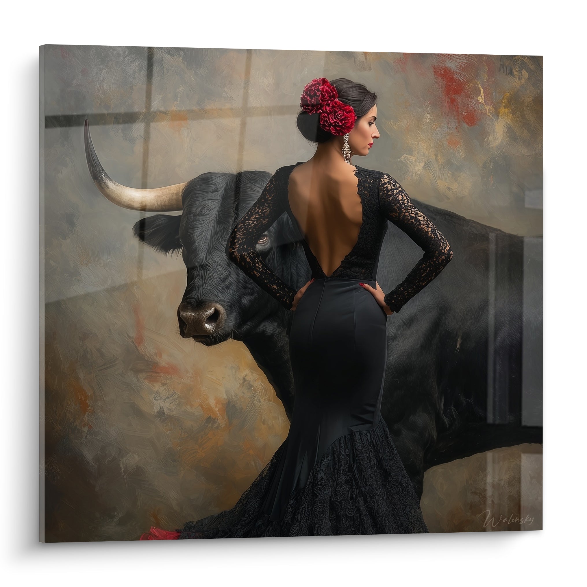 Danse espagnole en robe noire de dentelle, dos nu, devant un taureau anthracite aux cornes claires