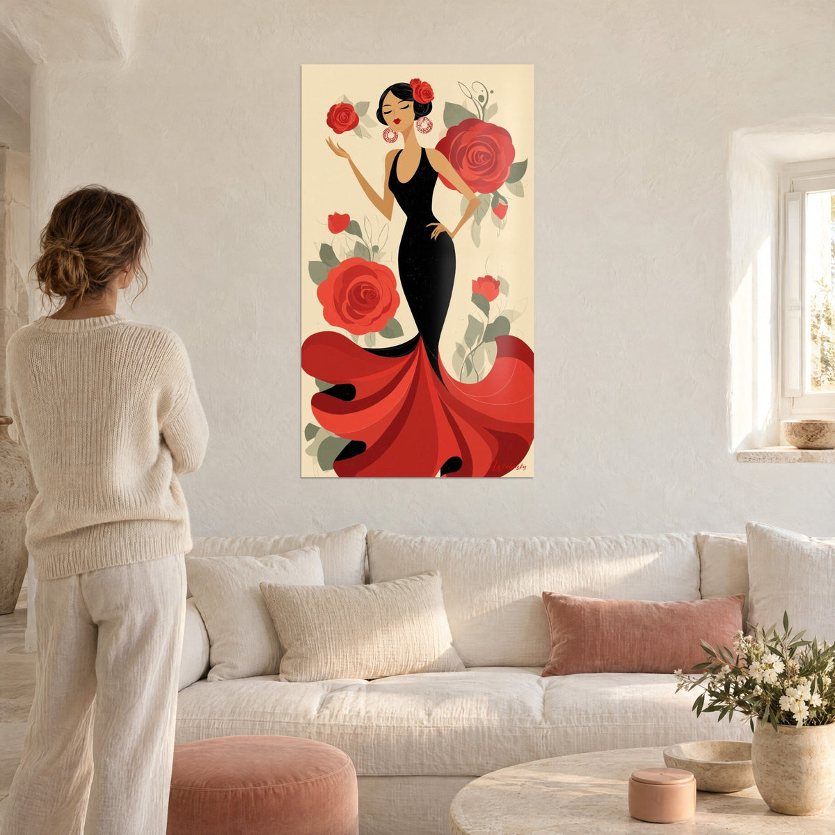 Tableau danseuse flamenca en robe noire et volants rouges parmi des roses géantes, au-dessus d'un canapé dans un salon lumineux
