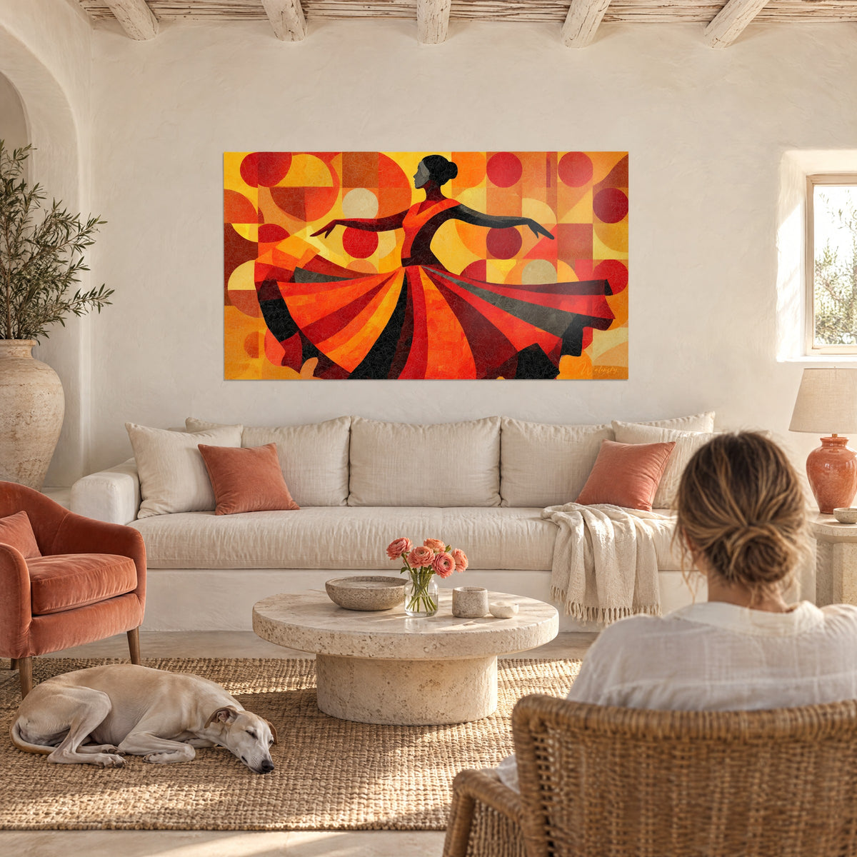 Wall art Spanish dancer in black silhouette, swirling red and ochre skirt, above a sofa in a bright living room