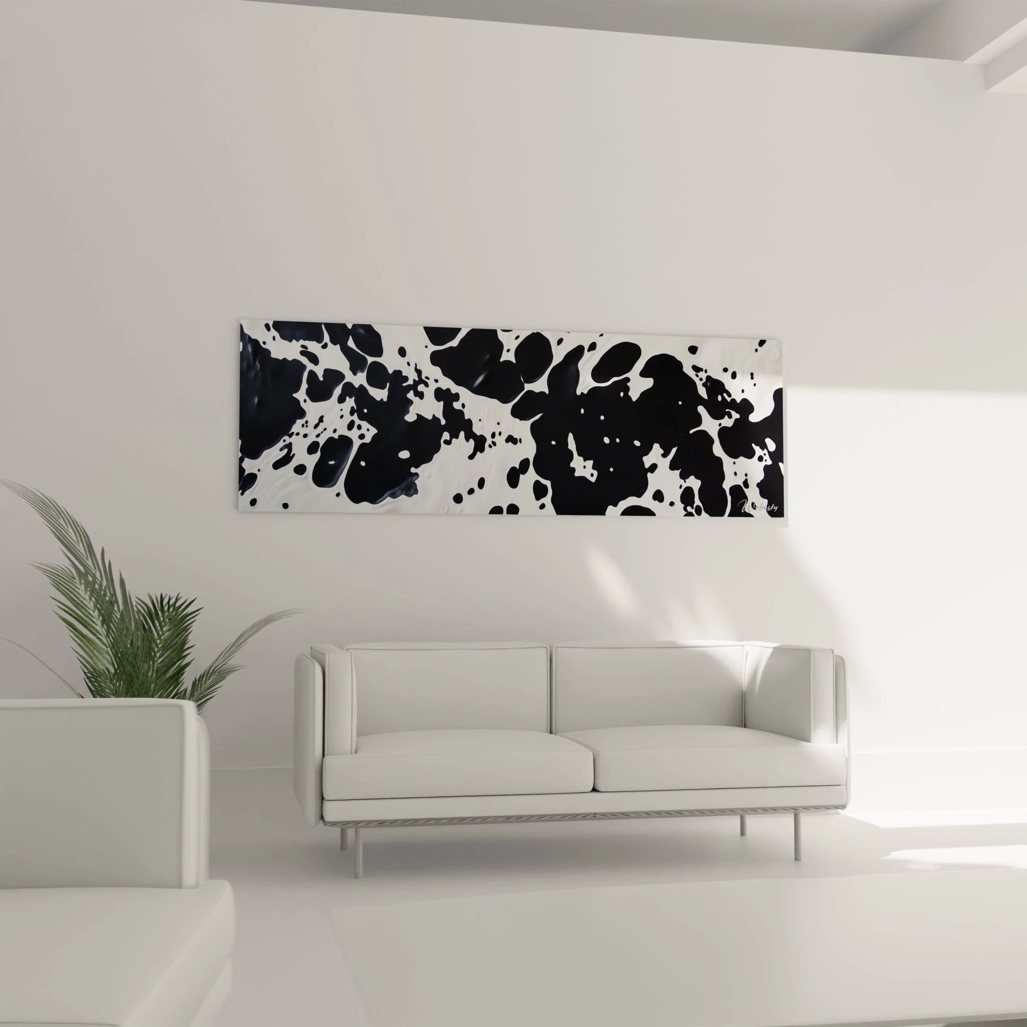 Tableau tacheté noir et blanc de Walensky suspendu dans un salon moderne avec canapé blanc