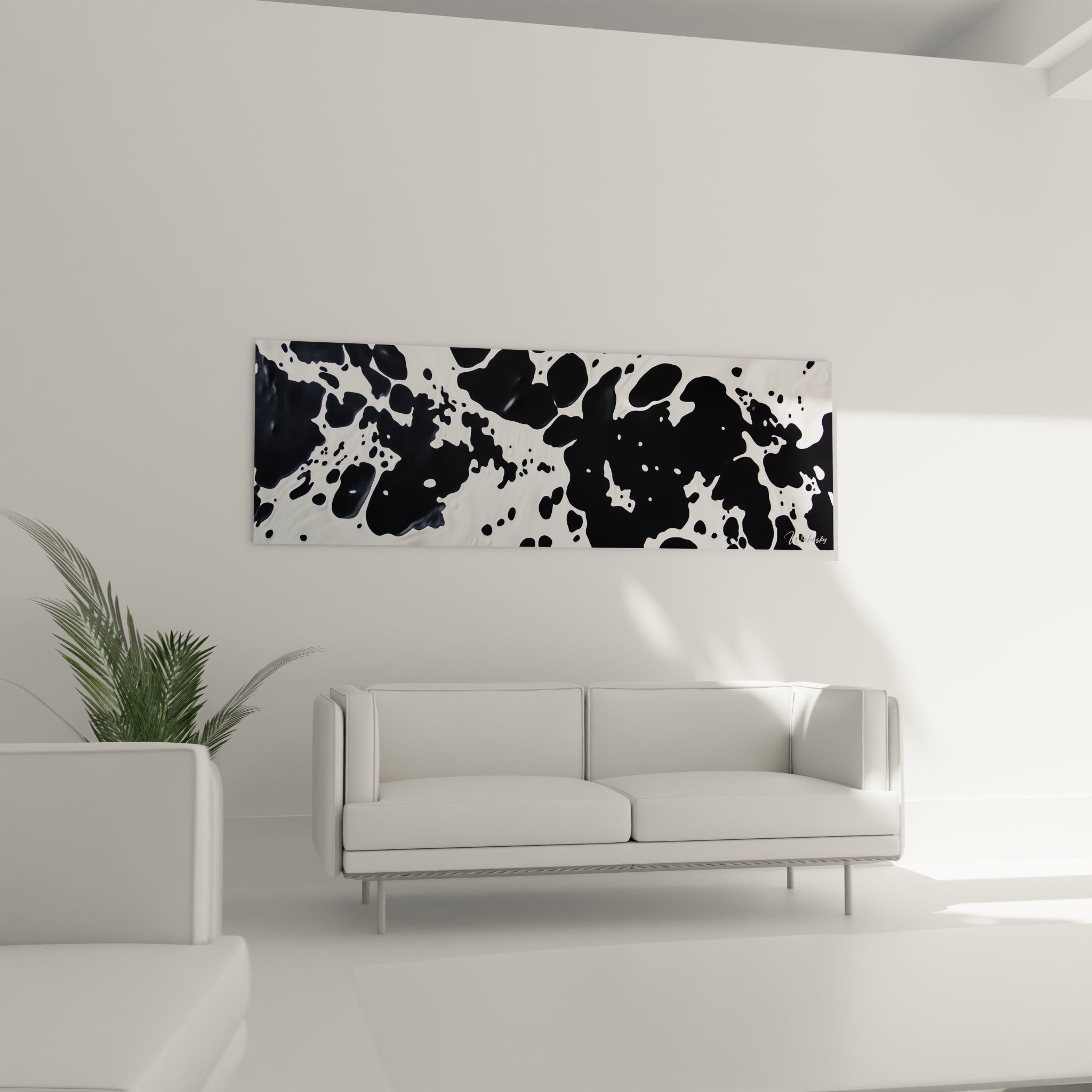 Tableau tacheté noir et blanc de Walensky suspendu dans un salon moderne avec canapé blanc