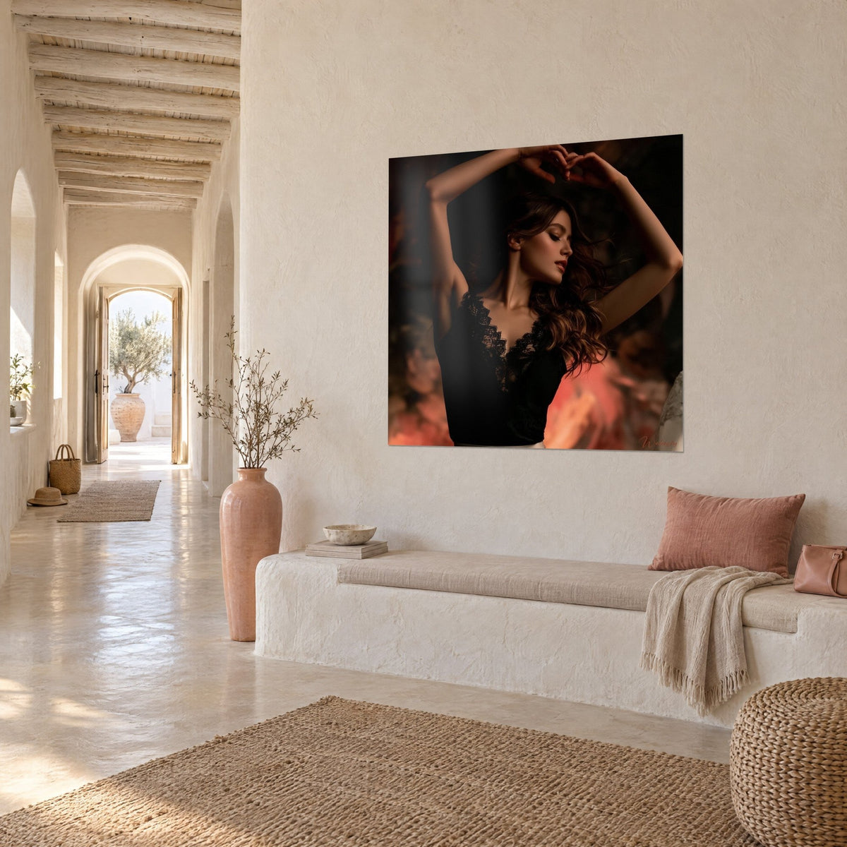Wall art female silhouette in black lace, red lips and brown curls, cream wall of an arched hallway, three-quarter view