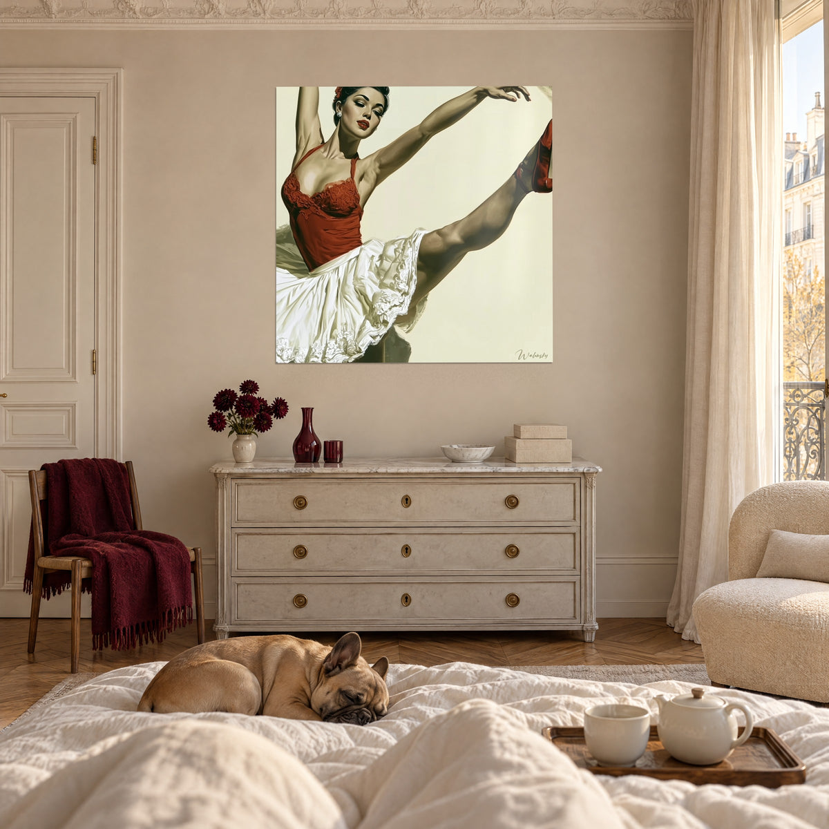 Wall art ballet dancer with a brown chignon, red pointe shoe extended and white tutu against an ivory background, hung above a bed in a bright bedroom