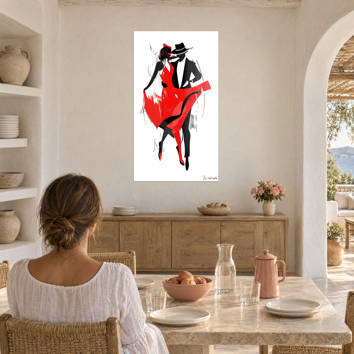 Πίνακας πάθος σε κόκκινο και μαύρο, αγκαλιασμένο ζευγάρι με ξερές πινελιές, απέναντι από τραπέζι φαγητού σε μεσογειακό σπίτι