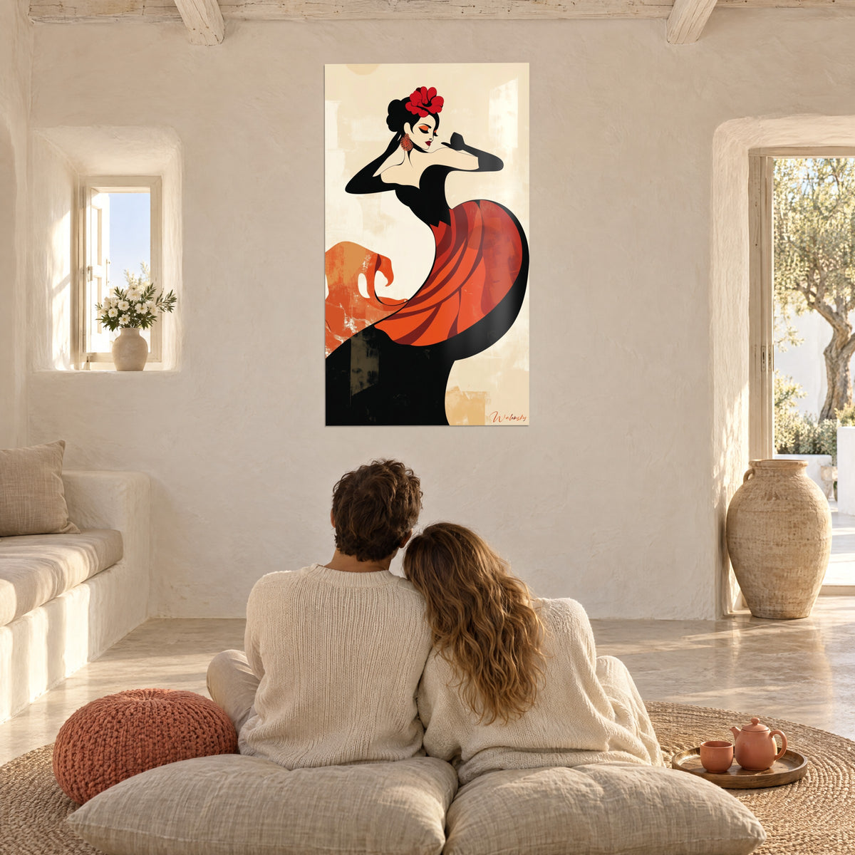Wall art Dame Rouge with an orange earring, black arms folded, copper-coloured skirt on sand background, facing two people in an embrace