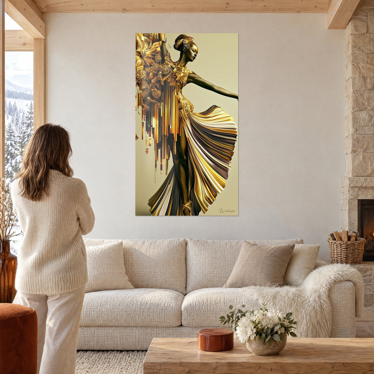 Cuadro estatua de bailarina en oro y bronce, falda plisada ocre y marfil, flores esculpidas, sobre un sofá en un salón luminoso