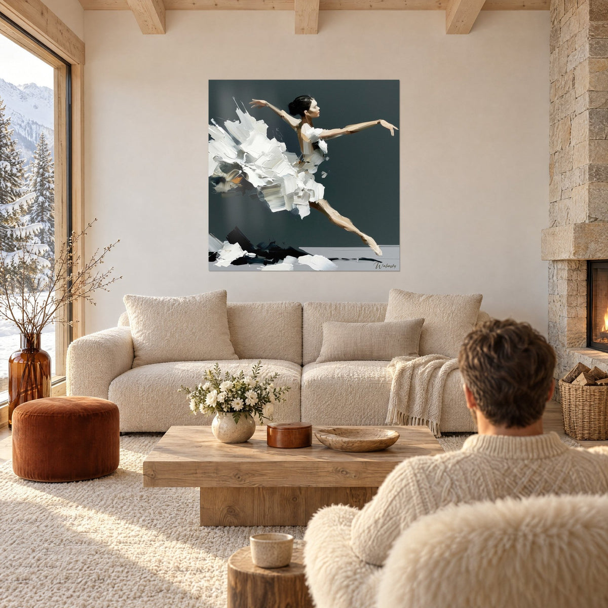 Tableau danseuse en grand saut, tutu blanc en empâtements sur fond gris ardoise, au-dessus d'un canapé dans un salon lumineux