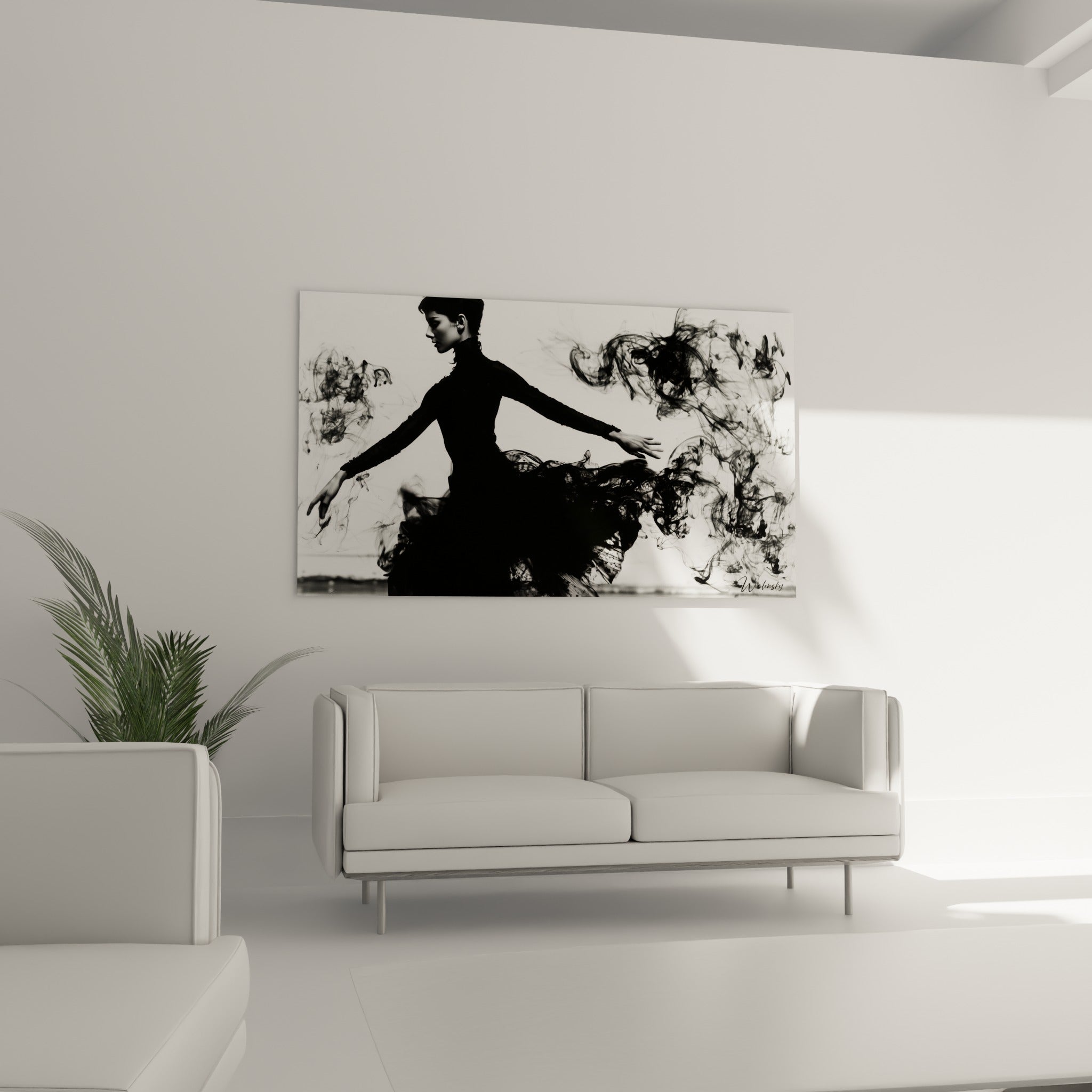 Geste de danseuse abstraite entre noir profond et blanc pur, œuvre disposée au-dessus d'un canapé dans un salon lumineux