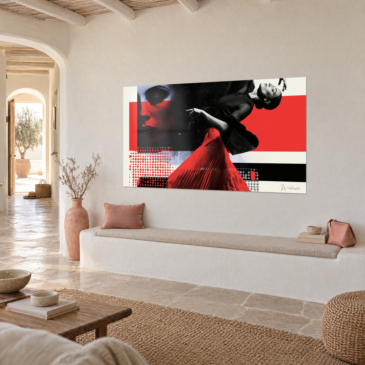Wall art backbent ballerina, face in red and black dots, vermilion flat areas, three-quarter view in a lounge