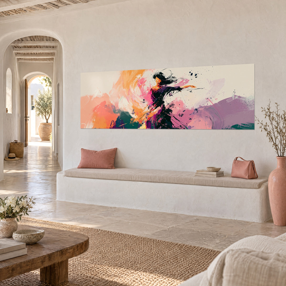 Wall art of a dancing silhouette in a dark dress, arm outstretched, bold strokes of vivid pink and deep green, whitewashed vaulted corridor