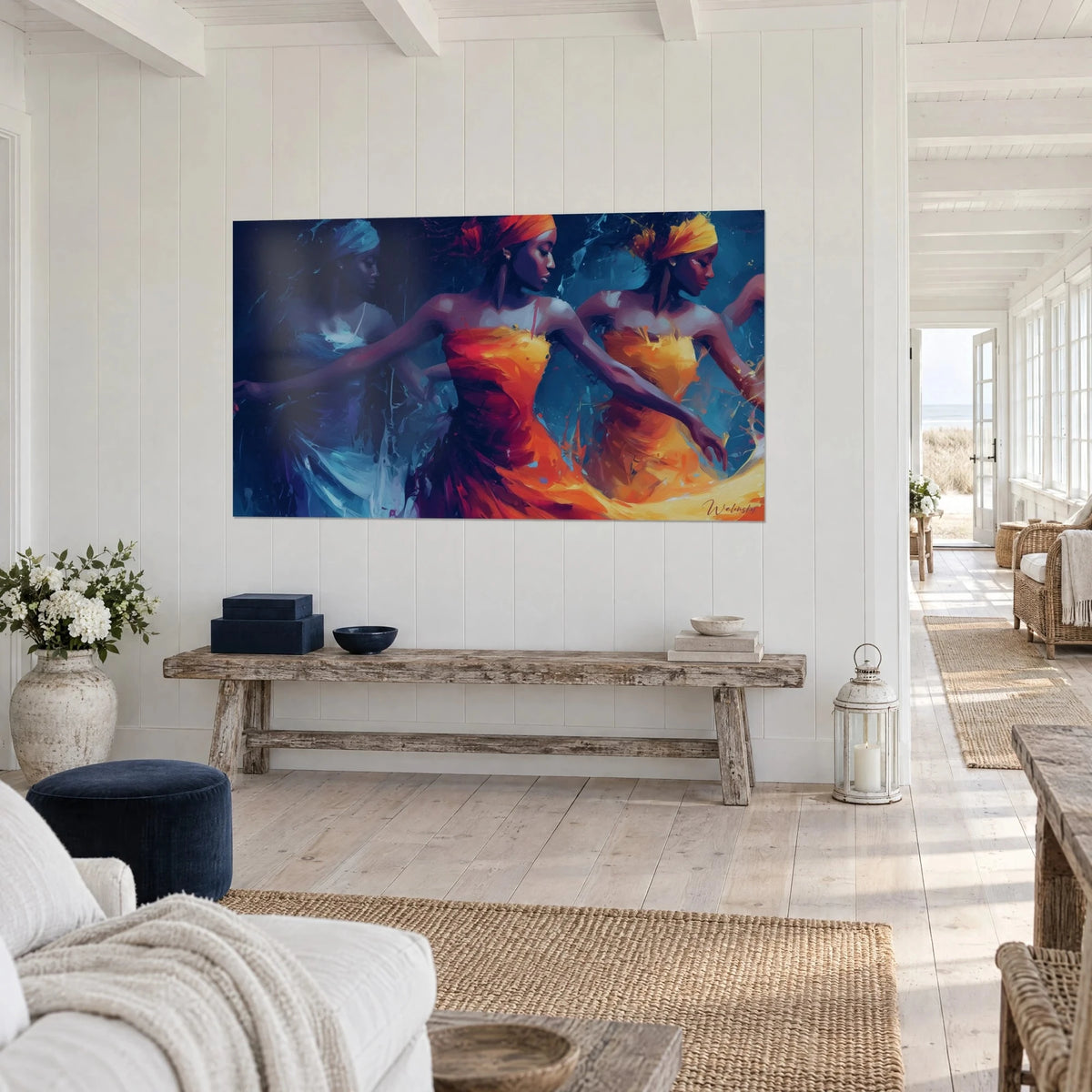 Wall art of a ballet of women in orange turbans, amber and glacier blue dresses, hung above a raw wood bench