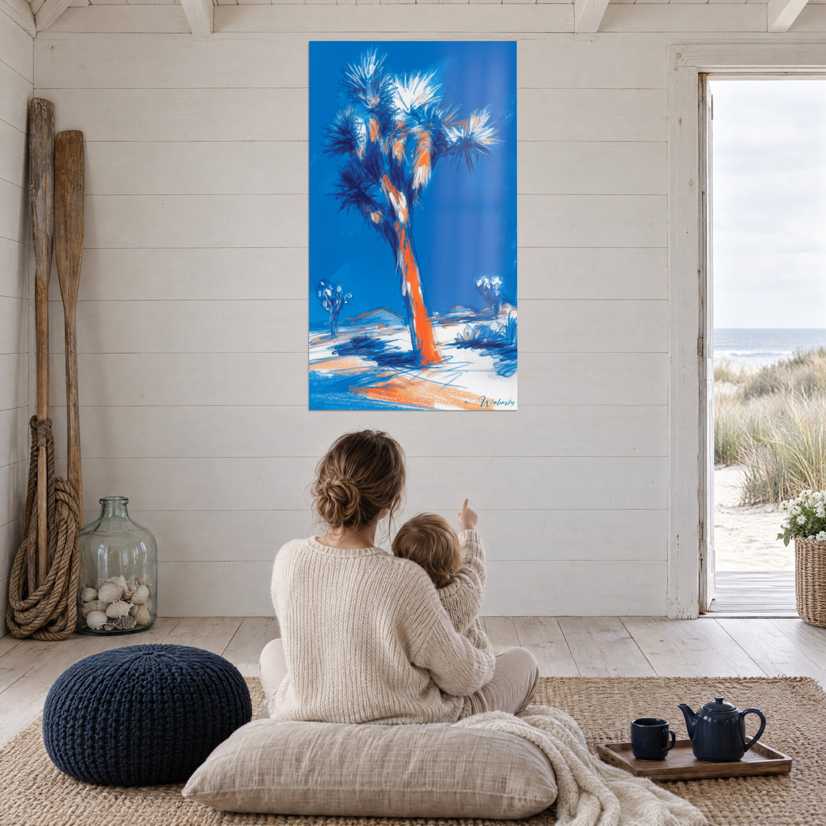 Wall art lone yucca in a lively sketch, orange trunk and royal blue sky, mother and baby seen from behind, seaside house