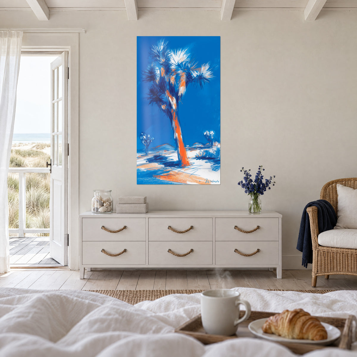 Wall art white-tipped yucca in silhouette, orange and white ground, above a bed in a light bedroom