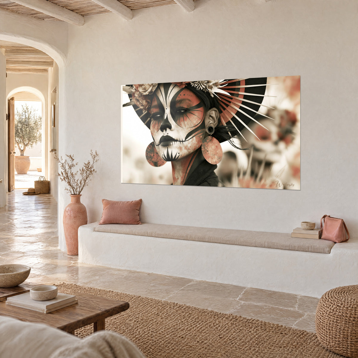 Wall art calavera makeup with black patterns, large rust-colored discs, three-quarter view in a Mediterranean home