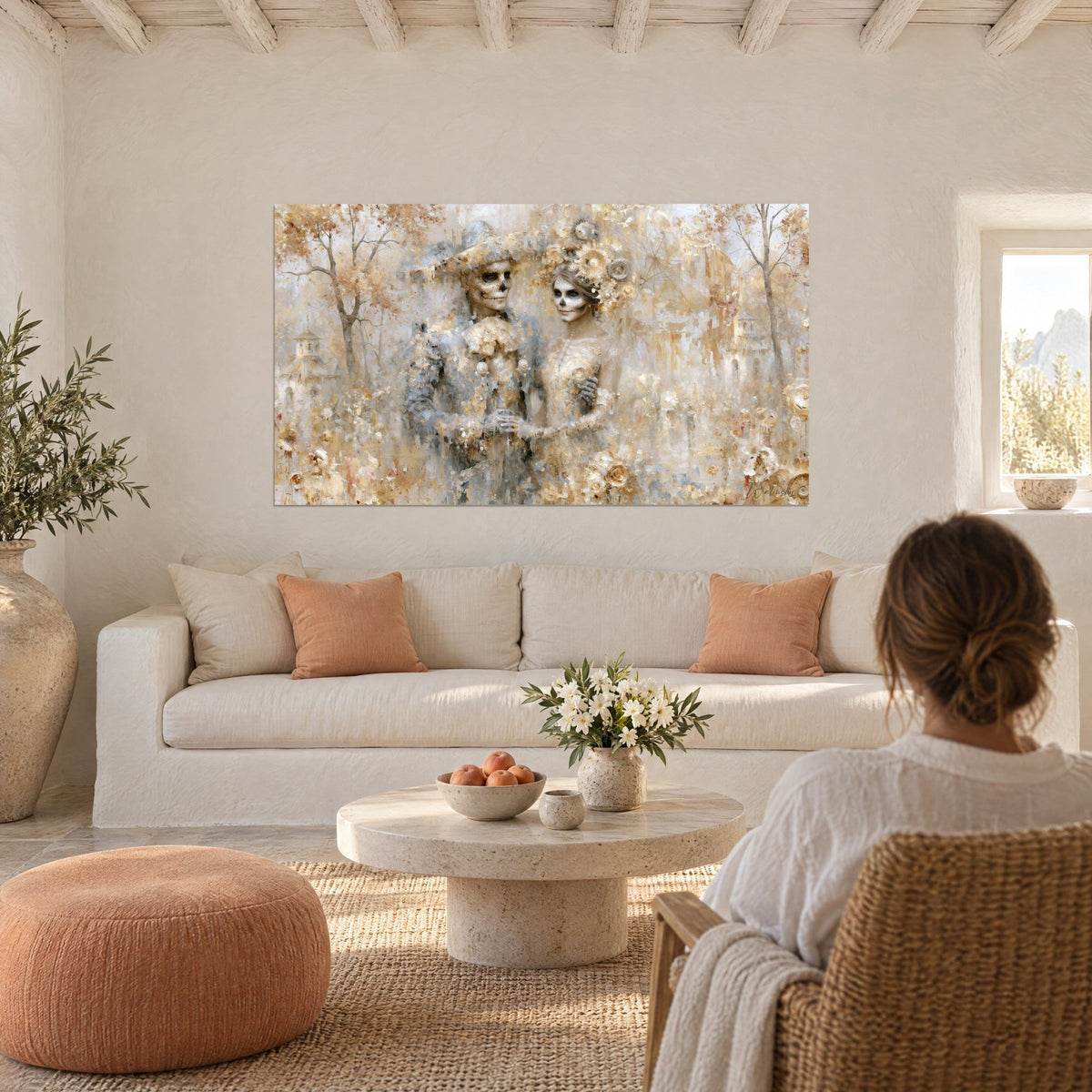 Wall art golden wedding skeleton couple, ivory dress and pearl grey hat, above a sofa in a bright living room