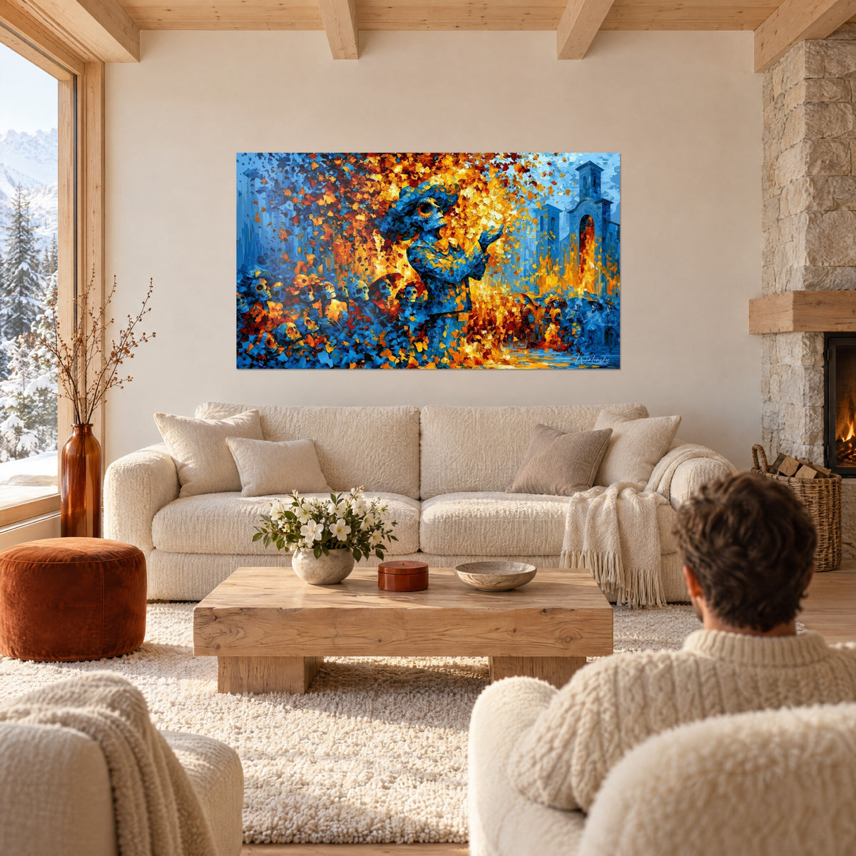 Wall art blue skeleton with raised hands among orange and yellow petals, church in the background, above a sofa in a bright living room