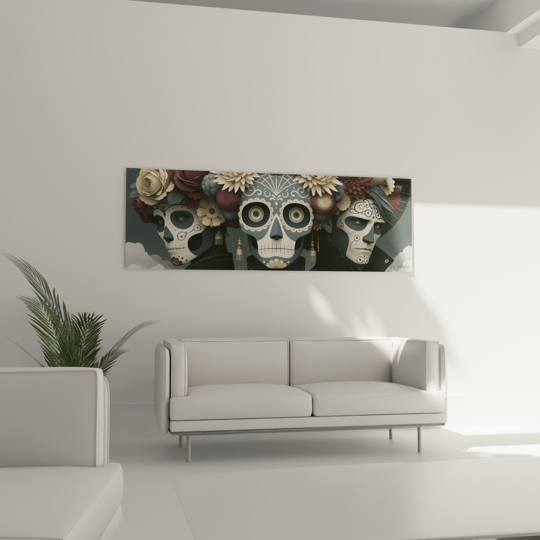 Visages ornés Dia de los Muertos en ivoire et anthracite disposés au-dessus d'un canapé dans un salon lumineux