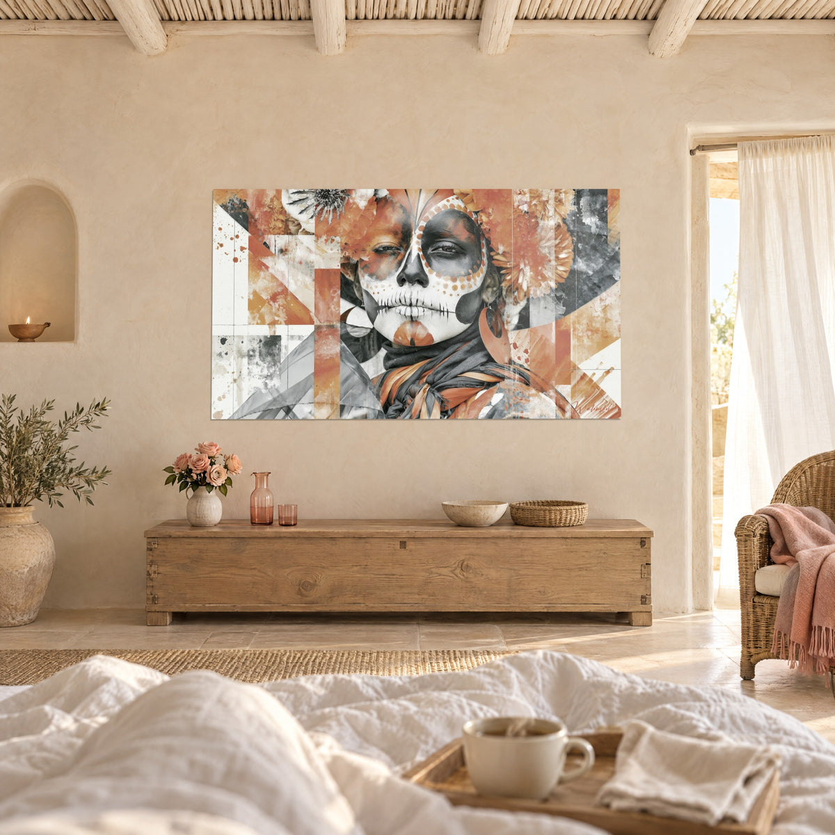Wall art Mexican skull with orange flowers, grey scarf striped with terracotta, above a bed in a light bedroom