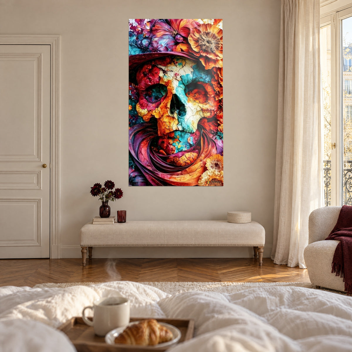 Wall art calavera with red and gold petals, visible from a white bed above a bed in a bright bedroom