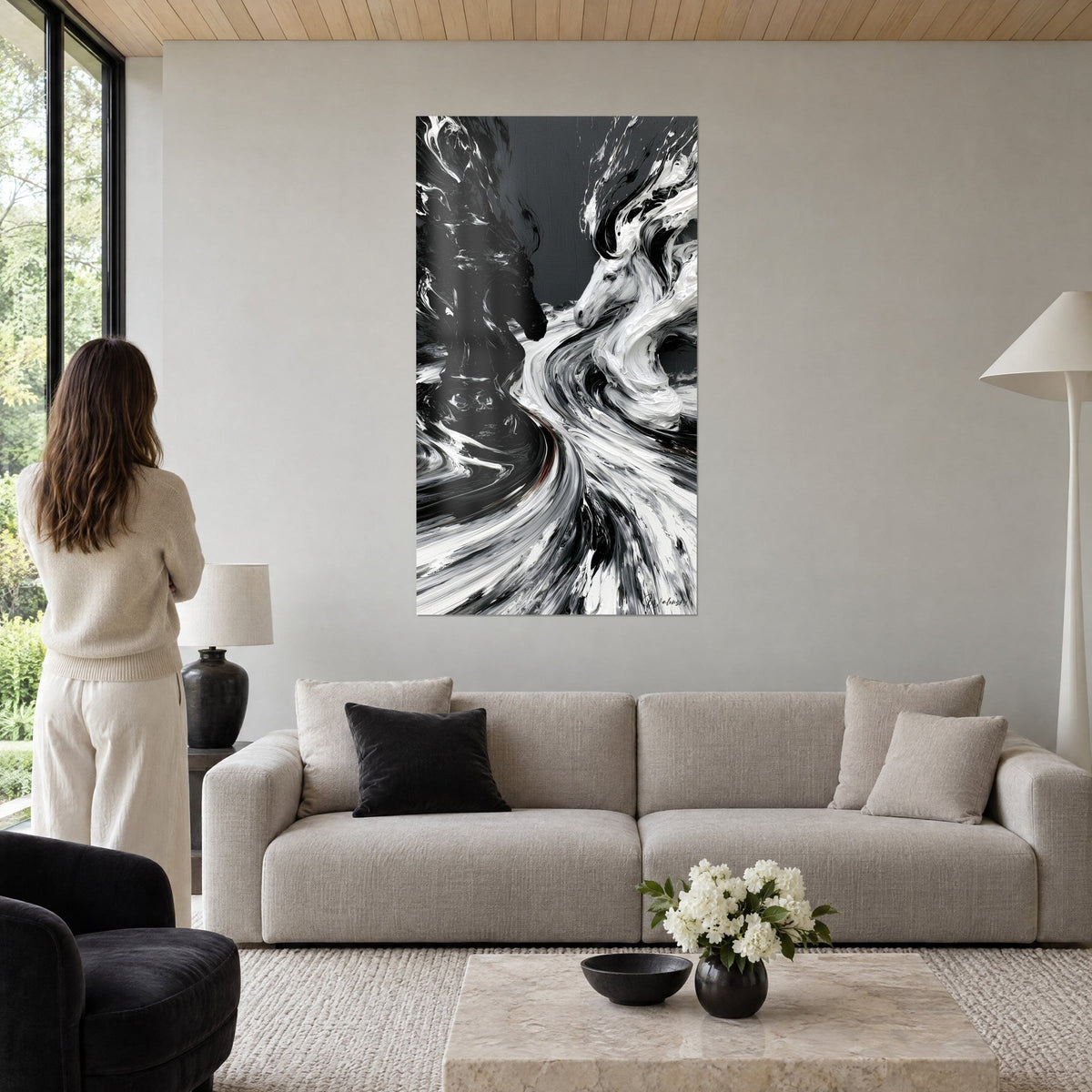 Wall art black chess horse facing a white unicorn, anthracite grey oil swirls, above a sofa in a bright living room