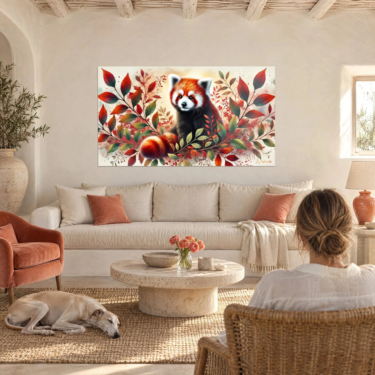 Tableau petit panda roux au pelage roux et blanc, entouré de feuilles rouges et vertes, au-dessus d'un canapé dans un salon lumineux