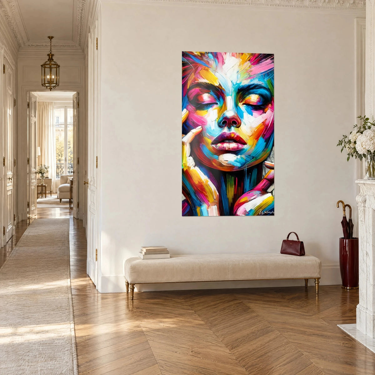 Wall art pop art portrait with turquoise features and vivid orange, magenta strands fanning out, hung in a Haussmann-style corridor