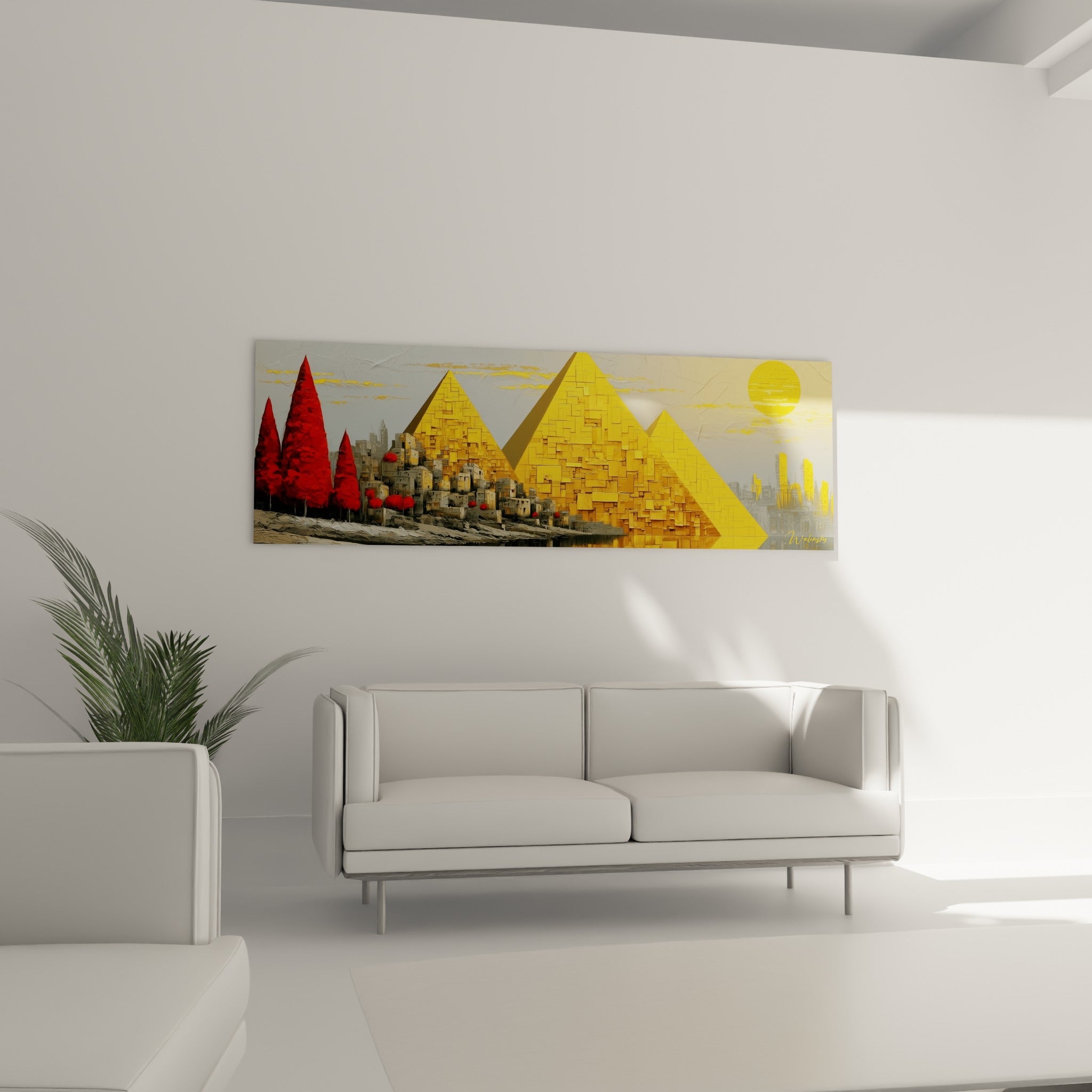 Paysage pyramidal doré et végétation rouge intense installé au-dessus d'un canapé dans un salon lumineux