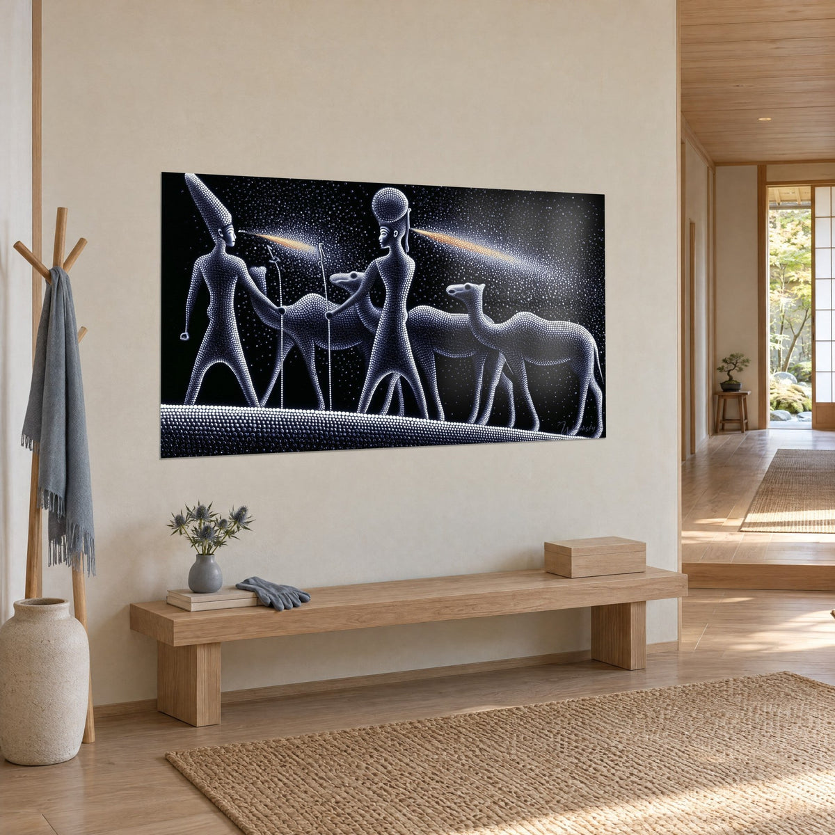 Wall art silvery pointillist pharaohs guiding three dromedaries, orange comets on a black night, hung in a Japandi entryway