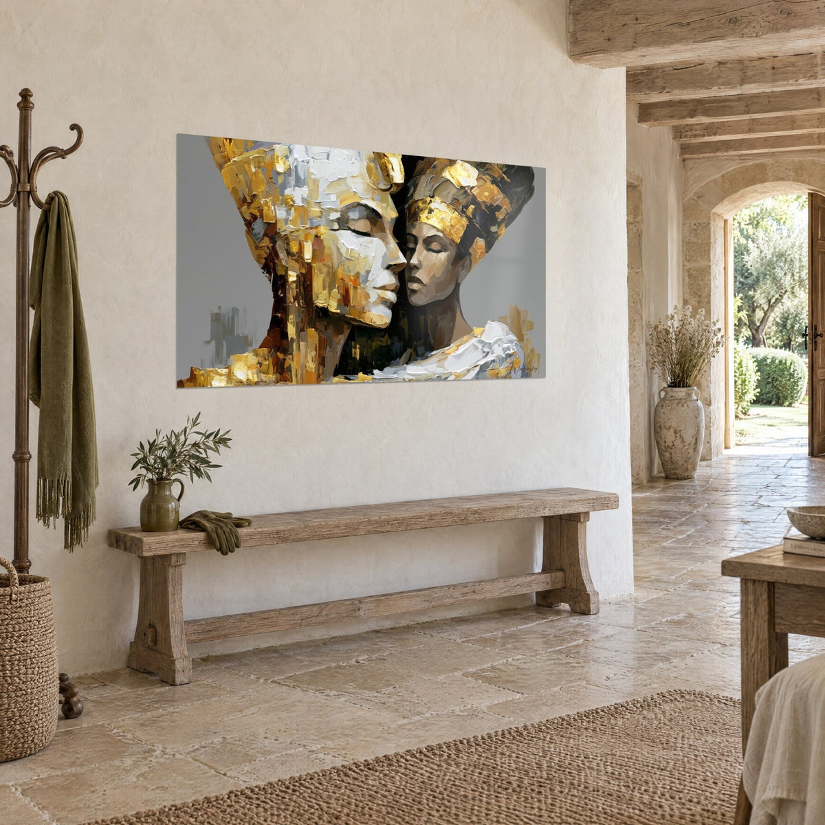Wall art pair of pharaonic women with closed eyelids, gold and ivory impasto on grey background, above a wooden console