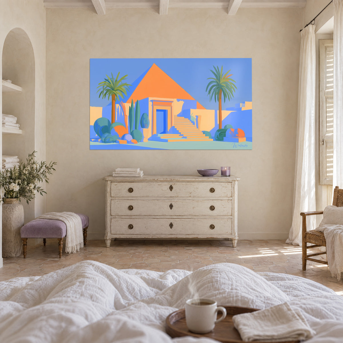 Wall art ochre-orange solar pyramid and lavender-blue sky, green palm trees on either side, above a bed in a light bedroom