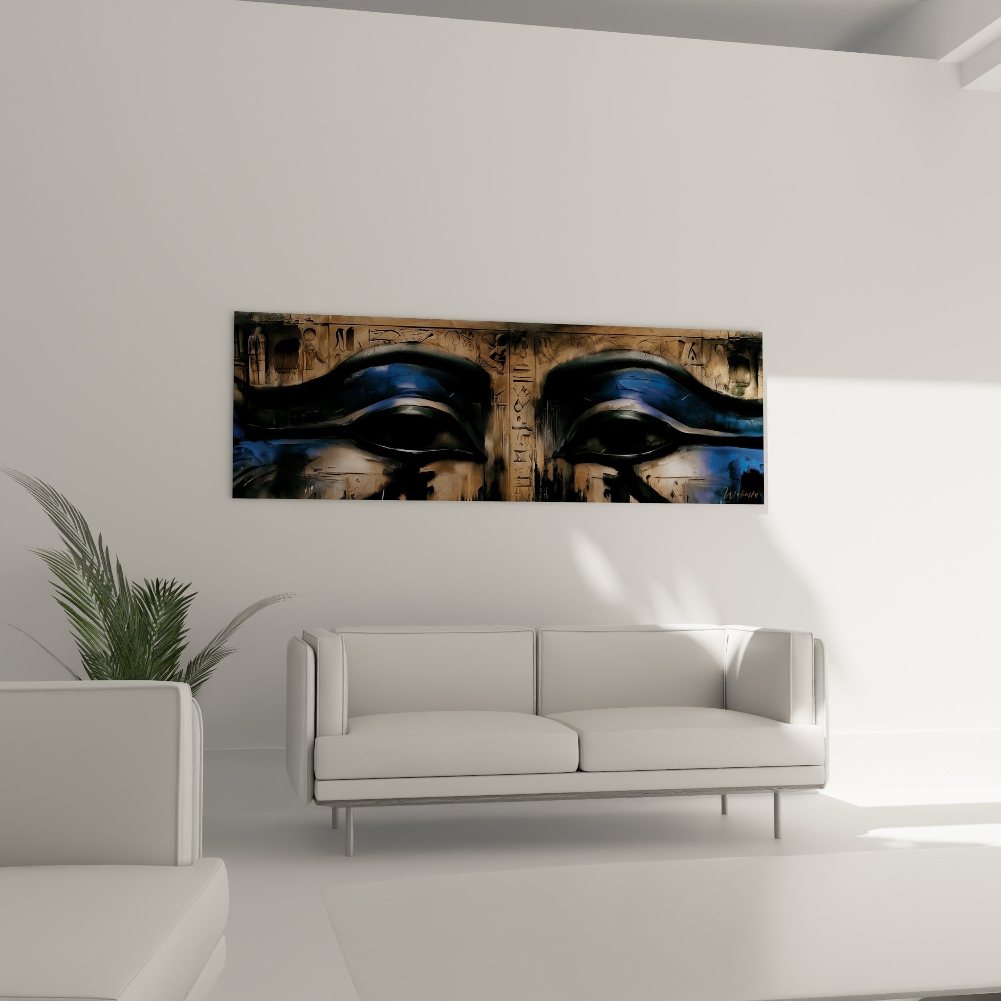 Symboles égyptiens noirs et ocre peints au-dessus d'un canapé dans un salon lumineux