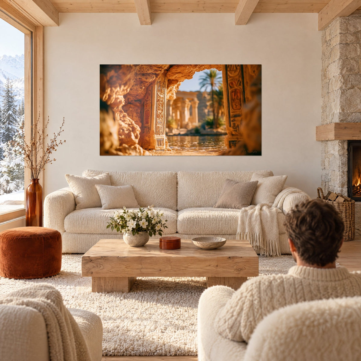 Wall art Egyptian temple with ochre and gold columns seen from behind by a couple, above a sofa in a bright living room