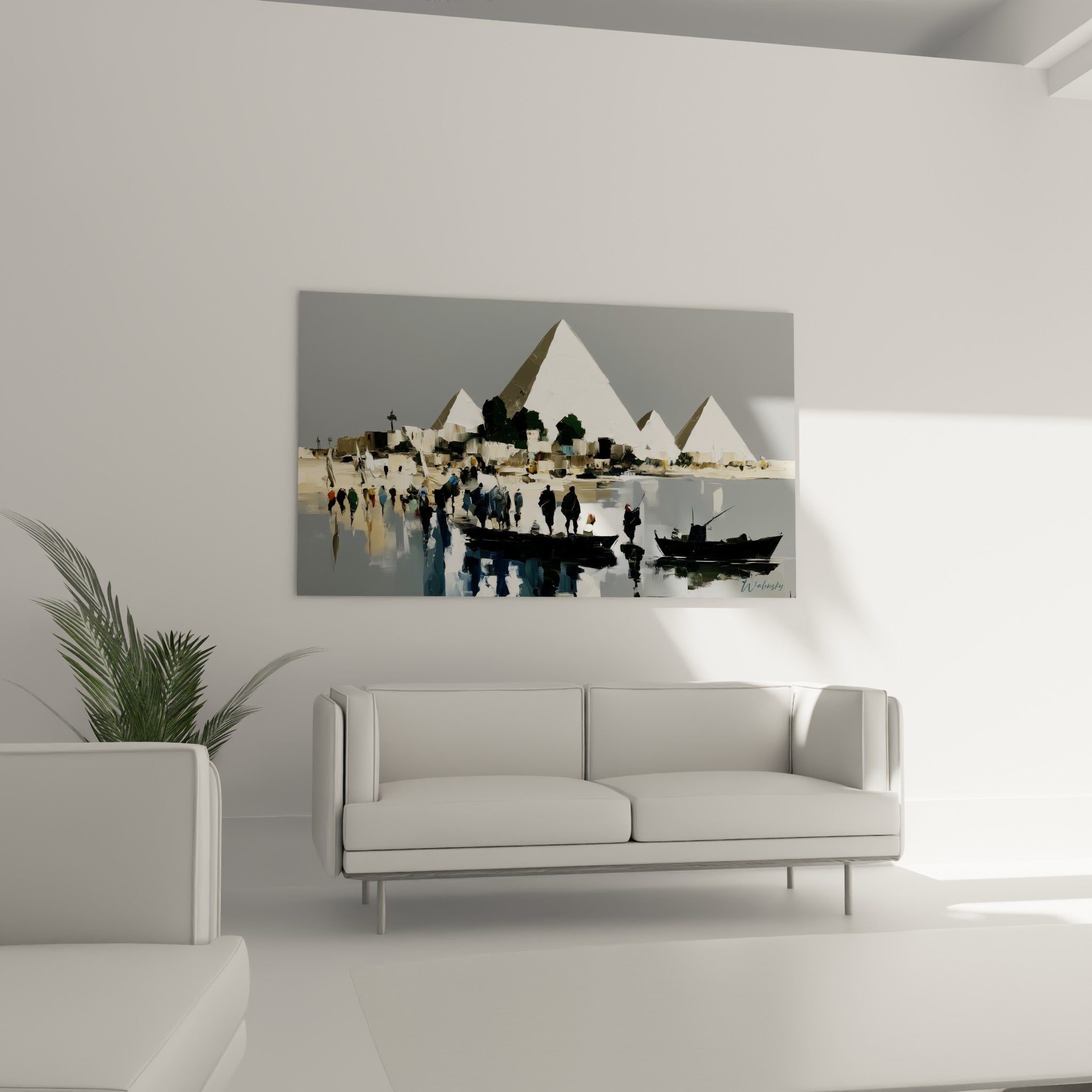 Scène du Nil aux pyramides grises et blanches, œuvre picturale placée au-dessus d'un canapé dans un salon lumineux