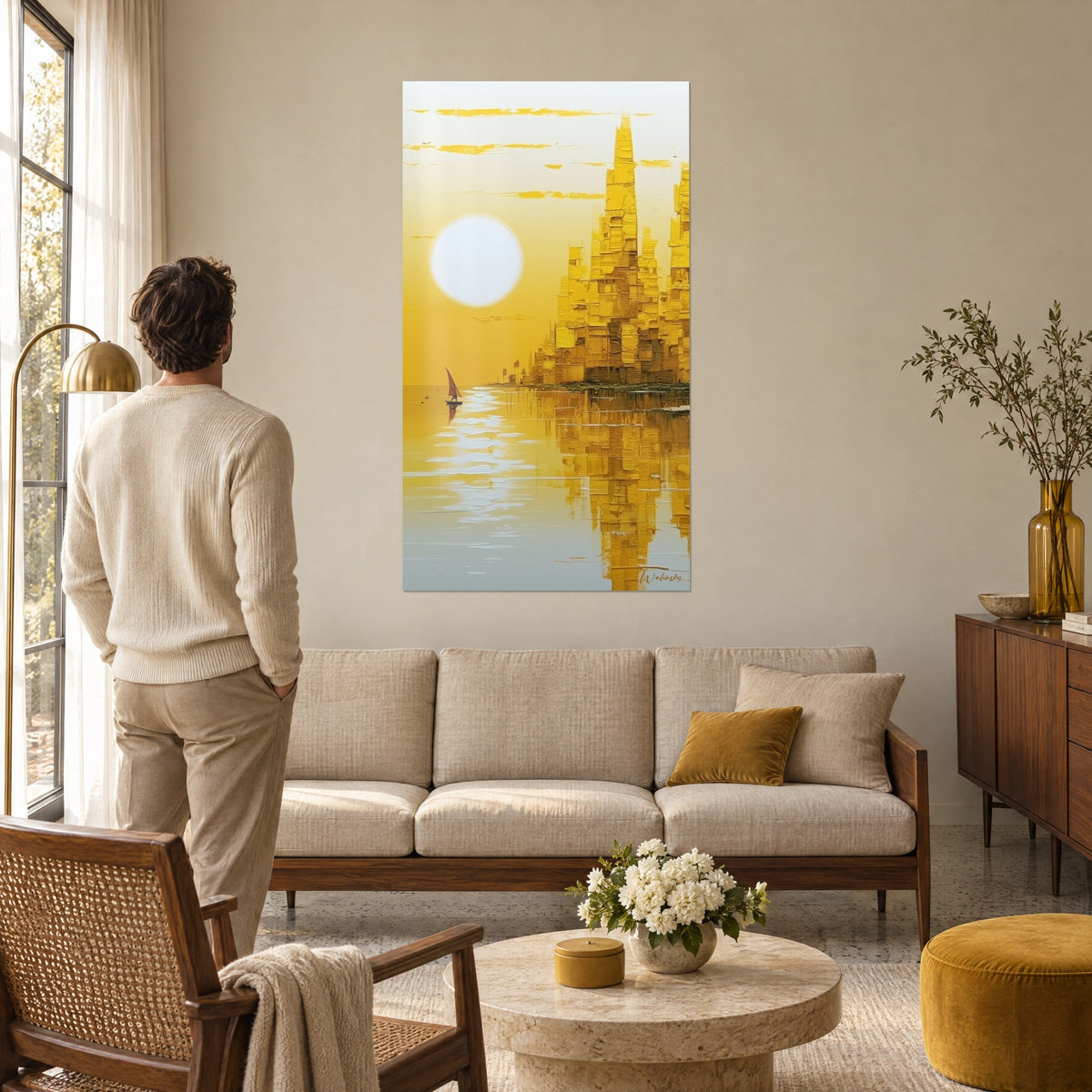 Wall art golden city with thick impasto towers, white sun and rust-coloured sail on the water, above a sofa in a bright living room