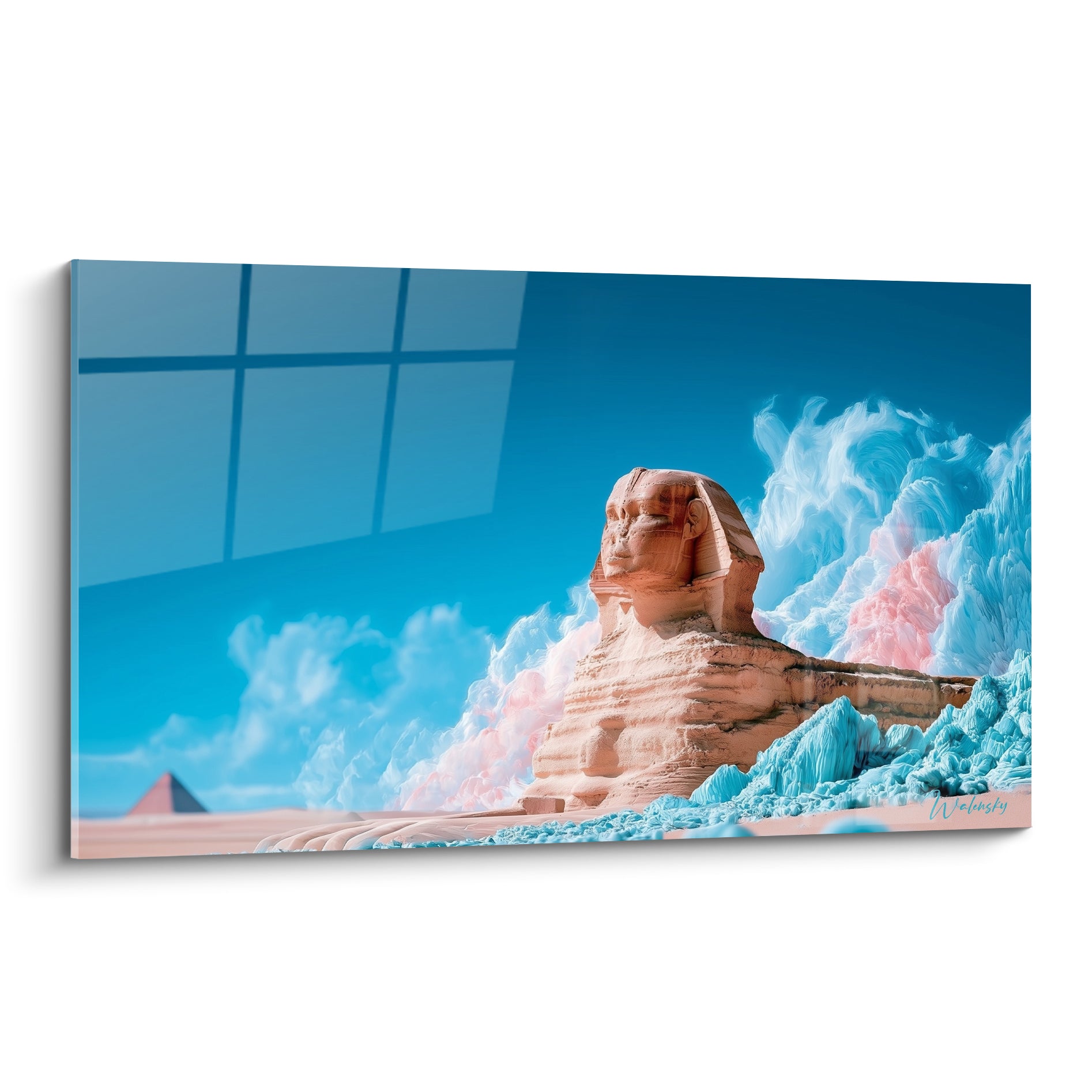 Sphinx de Gizeh ocre et beige veillant sous un ciel bleu intense parsemé de nuages roses