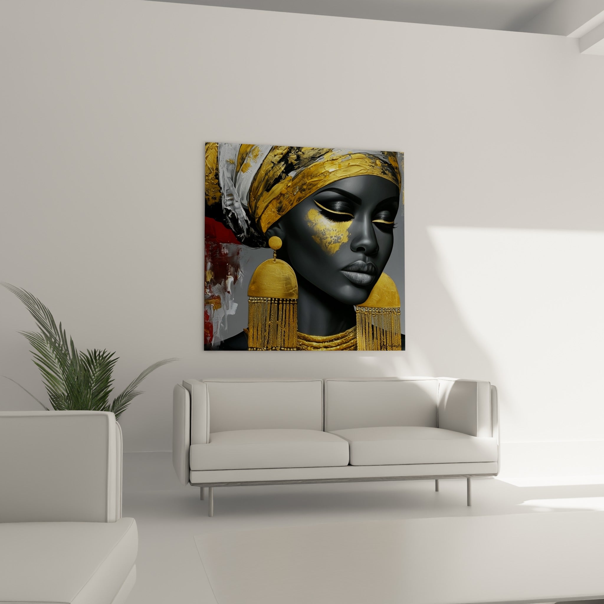 Visage anthracite paré d'or et de rouge terracotta au-dessus d'un canapé dans un salon lumineux