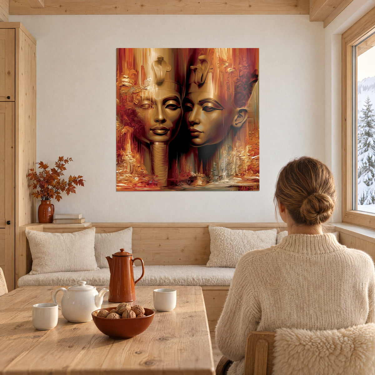 Quadro di busti di sovrani egizi, guancia a guancia, arancio bruciato e rosso cupo, di fronte a una donna seduta alla sua scrivania