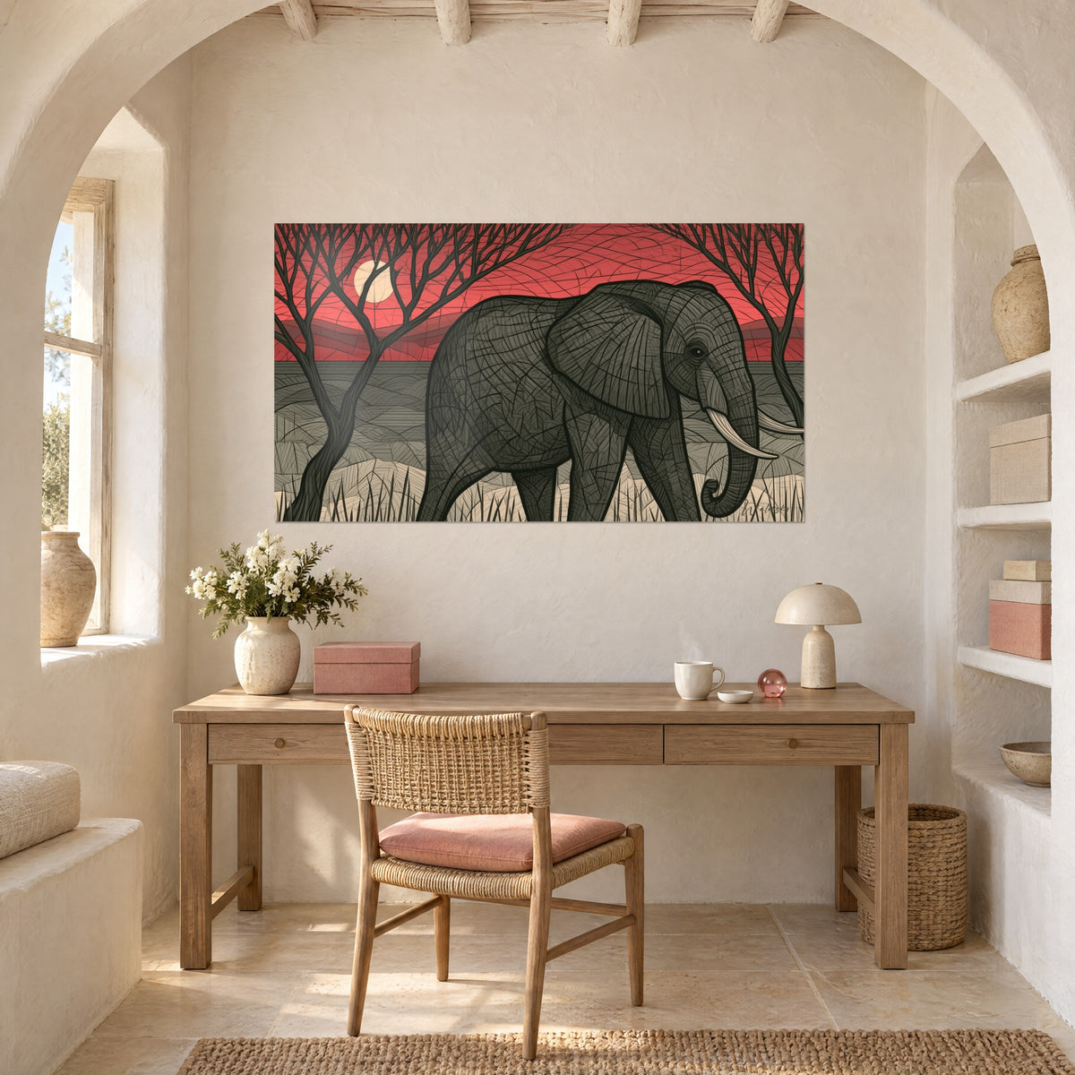 Quadro passeggiata al crepuscolo di un elefante grigio, colline rosse e luna tonda color crema, appeso sopra una scrivania in legno chiaro