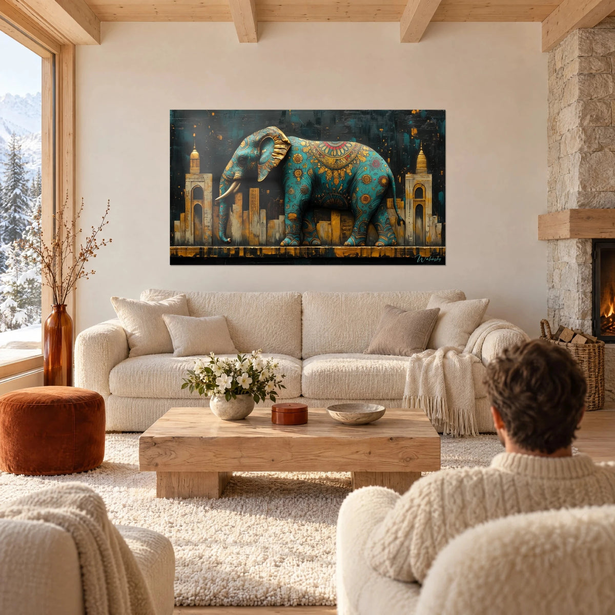 Wall art of a turquoise elephant with gold patterns, ochre minaret silhouettes and black background, above a sofa in a bright living room