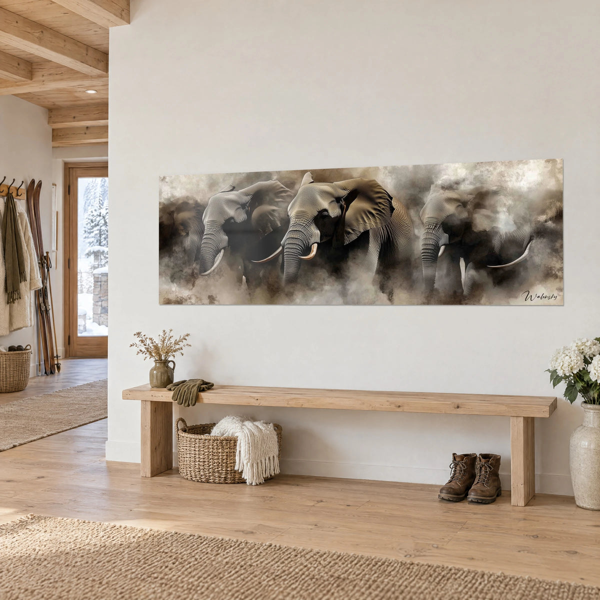 Schilderij kudde pachyderms met ivoren slagtanden in sepia- en grijstinten, opgehangen aan de witte entreemuur van een chalet