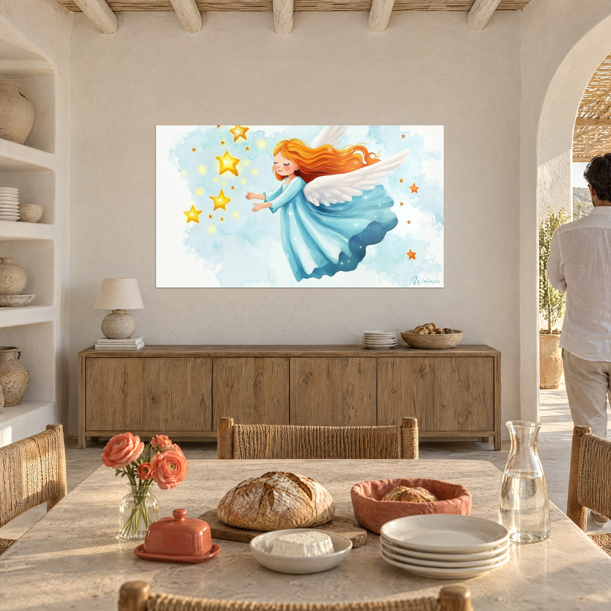Wall art of a winged guardian with closed eyelids and rosy cheeks, flowing azure dress, amber stars, white wall beside a dining table
